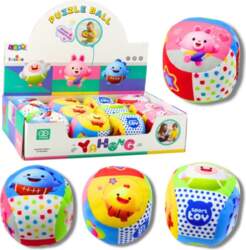 Soft ball with a rattle for