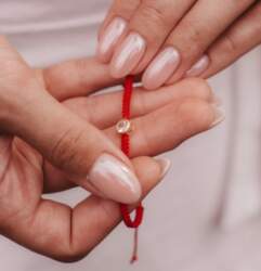 Red thread bracelet with zirconium
