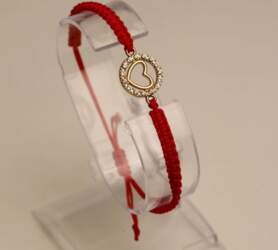 Red thread bracelet with heart