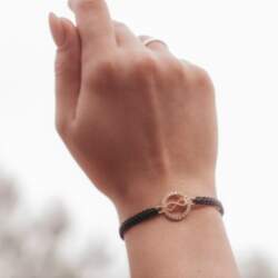 Red thread bracelet with infinity sign