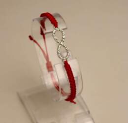 Red thread bracelet with infinity sign