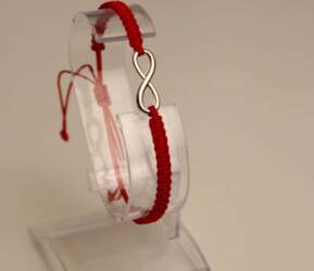 Red thread bracelet with infinity sign