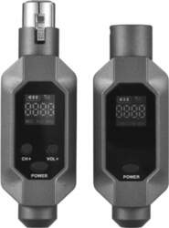 Microphone connected to wireless XLR transmitter